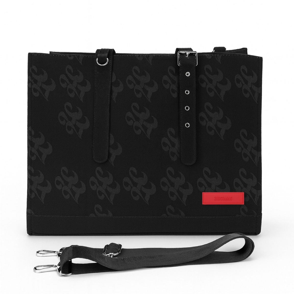 Black handbag with a strap and red label on a white background