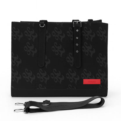 Black handbag with a strap and red label on a white background